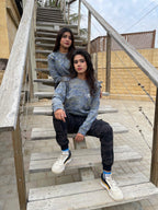 Lifestyle front view of the camo performance sweatshirt by Outgears Fitness Wear. Designed with a comfortable stretch fit and soft fabric for movement and everyday wear. Suitable for training, warm-ups, and casual outings.