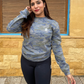 Women’s camo performance sweatshirt made from soft, breathable fabric. Designed for comfort, stretch, and everyday wear. Ideal for workouts, warm-ups, and casual styling.