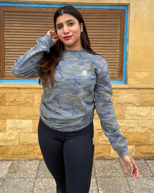 Women’s camo performance sweatshirt made from soft, breathable fabric. Designed for comfort, stretch, and everyday wear. Ideal for workouts, warm-ups, and casual styling.
