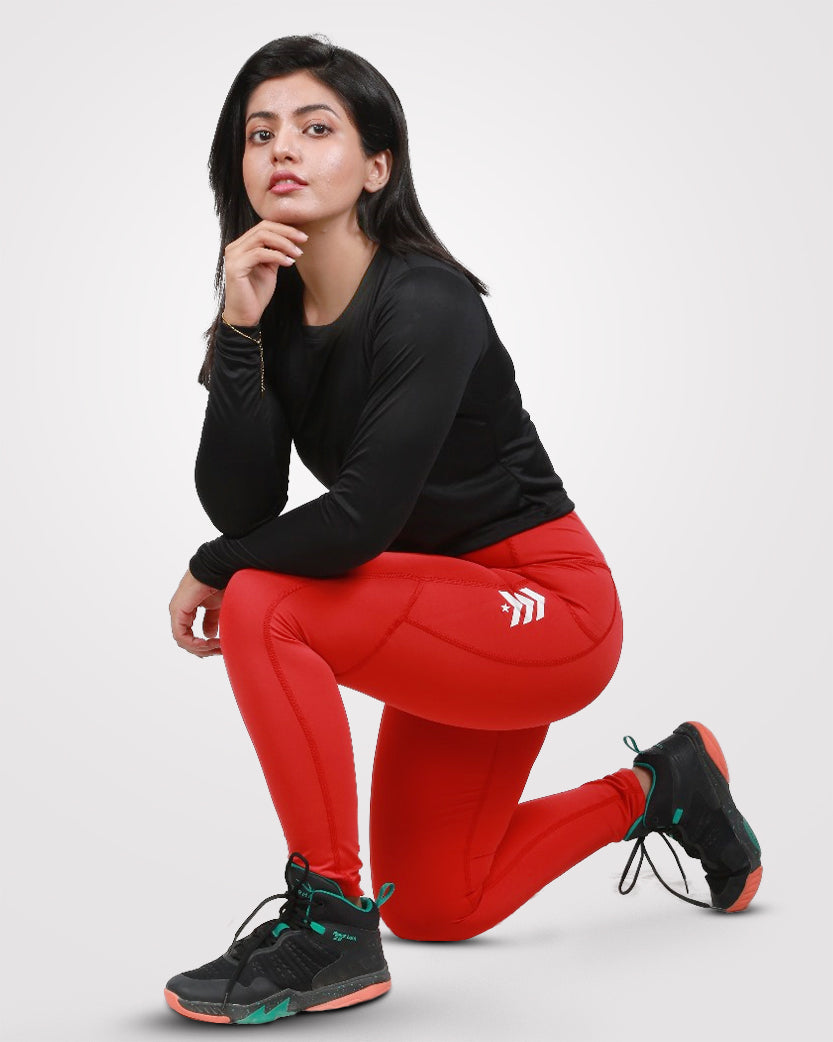The image depicts a pair of opaque gym tights with a high waist. The tights are smooth and evenly textured, extending from the high waist down to the toes. They are designed to be stretchy and form-fitting, making them suitable for workouts and various physical activities. Against a plain background, the tights' material and shape are clearly visible. These gym tights are versatile, ideal for wearing under workout gear or paired with casual attire for an athleisure look.